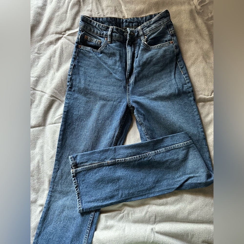 High waisted flare w/slit jeans
